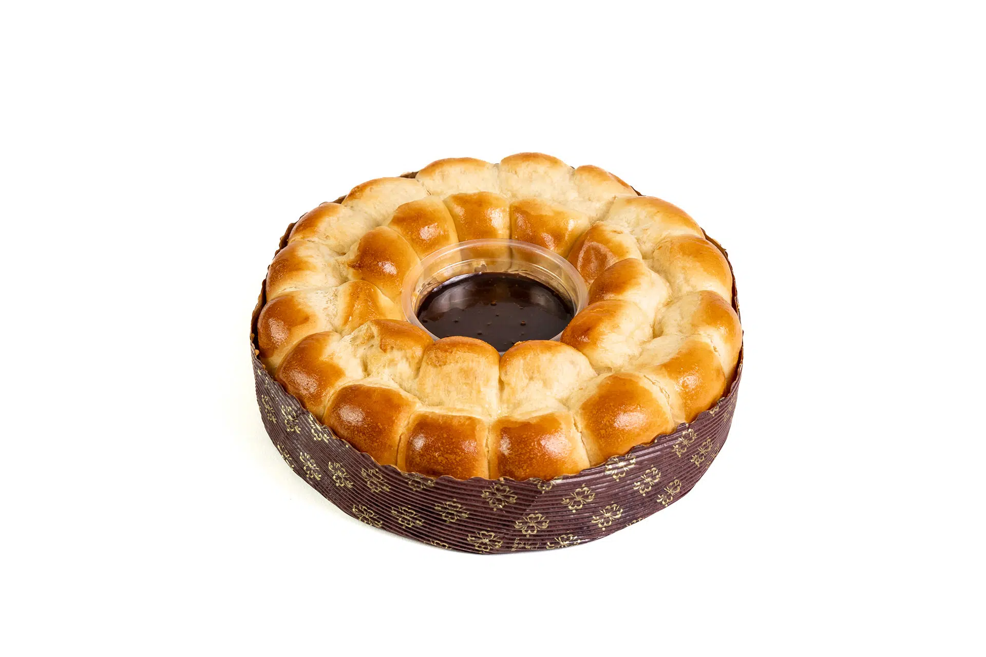 Product shot of a brioche with chocolate sauce on a white background