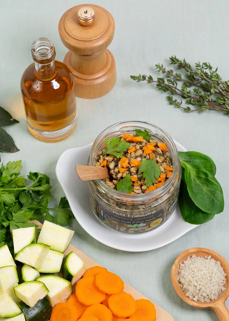 Product pack shot of Mont Ventoux small spelt in a glass jar — lifestyle food photography with a sage-green green screen, Paris