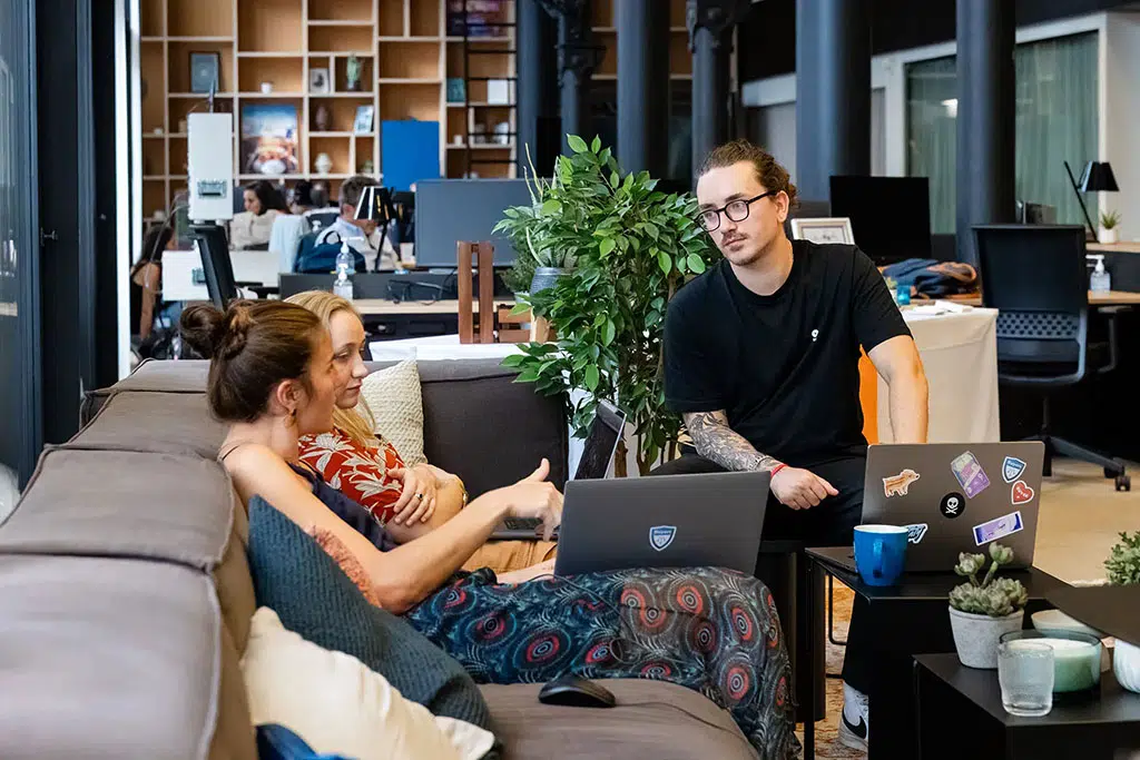 Corporate Photography Feature in Paris — IAD Immobilier employees during an informal get-together at a coworking space; corporate photography capturing startup culture — Guillaume Galmiche